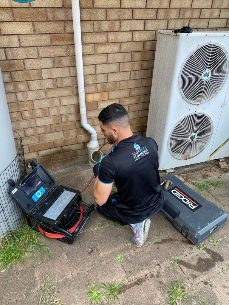 CCTV camera inspection of a blocked drain line